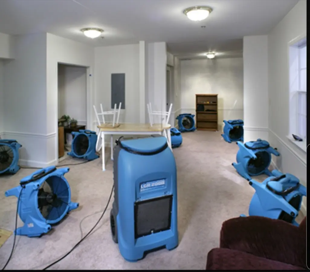 Air movers and dehumidifier setup for Water Damage Restoration in Woodlawn